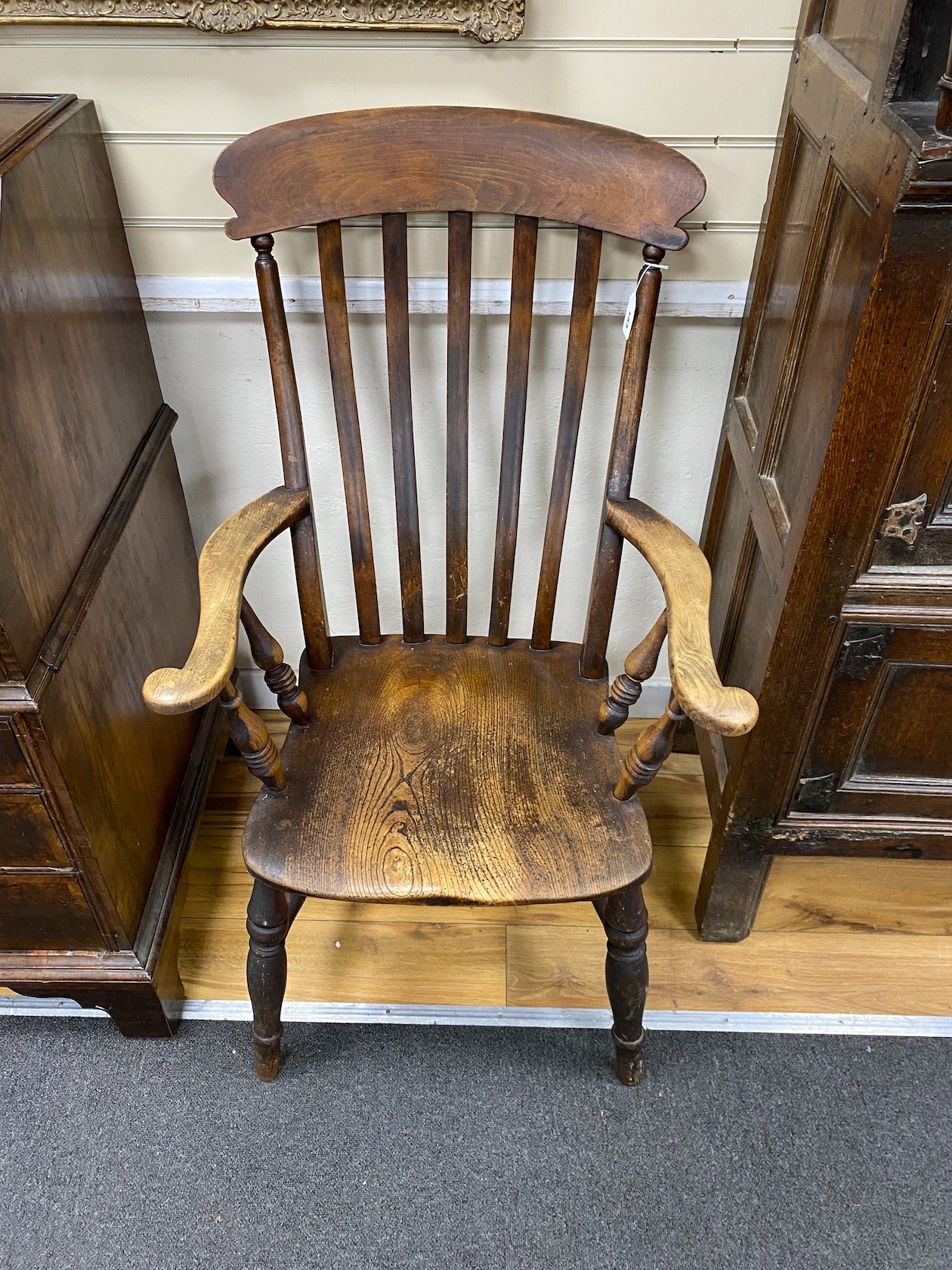 A Victorian elm and beech Windsor lathe back armchair, width 60cm, depth 46cm, height 109cm